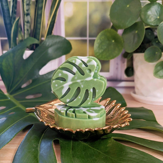 Hand made Soap-This tropical monstera leaf soap allows for your love of exotic plants extend to your sink, bringing a touch of nature's beauty to your daily routine. Smells lush and green with notes of wild fern, bergamot, plumeria, and lemon