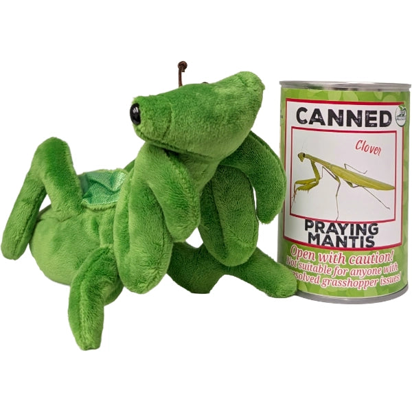 Green plush praying mantis toy next to a can labeled 'Canned Praying Mantis' on a white background